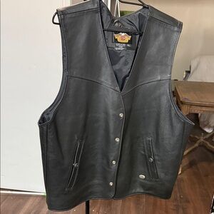 Harley-Davidson Black Leather Vest with Yellow Logo Patch.